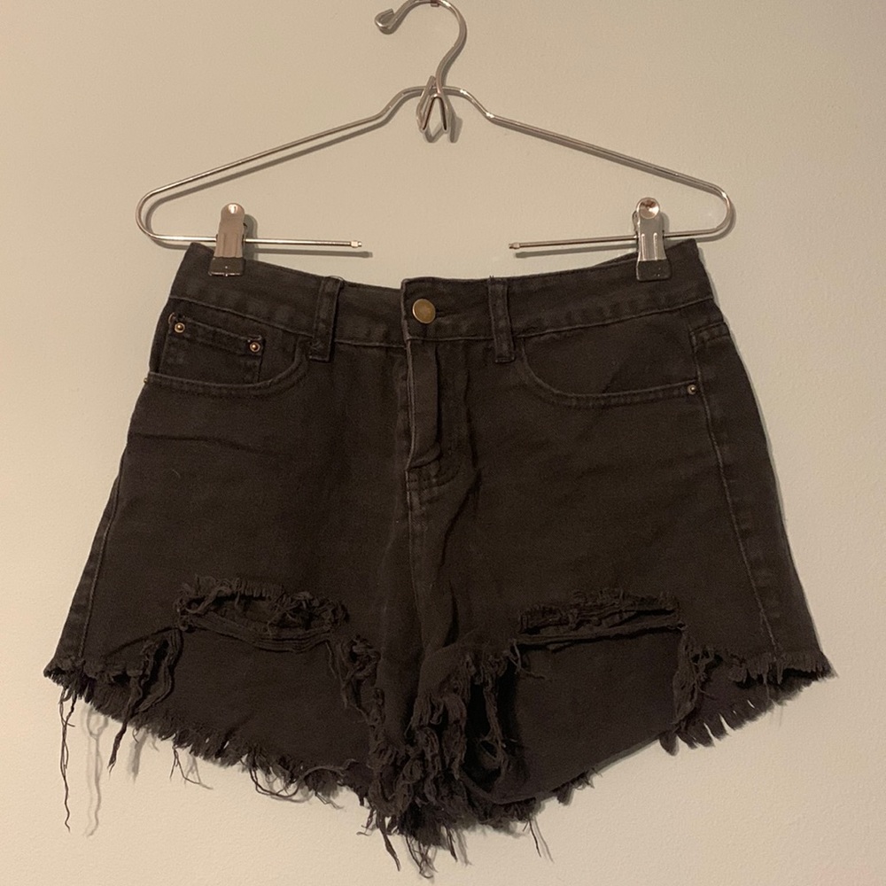 Black distressed shorts.